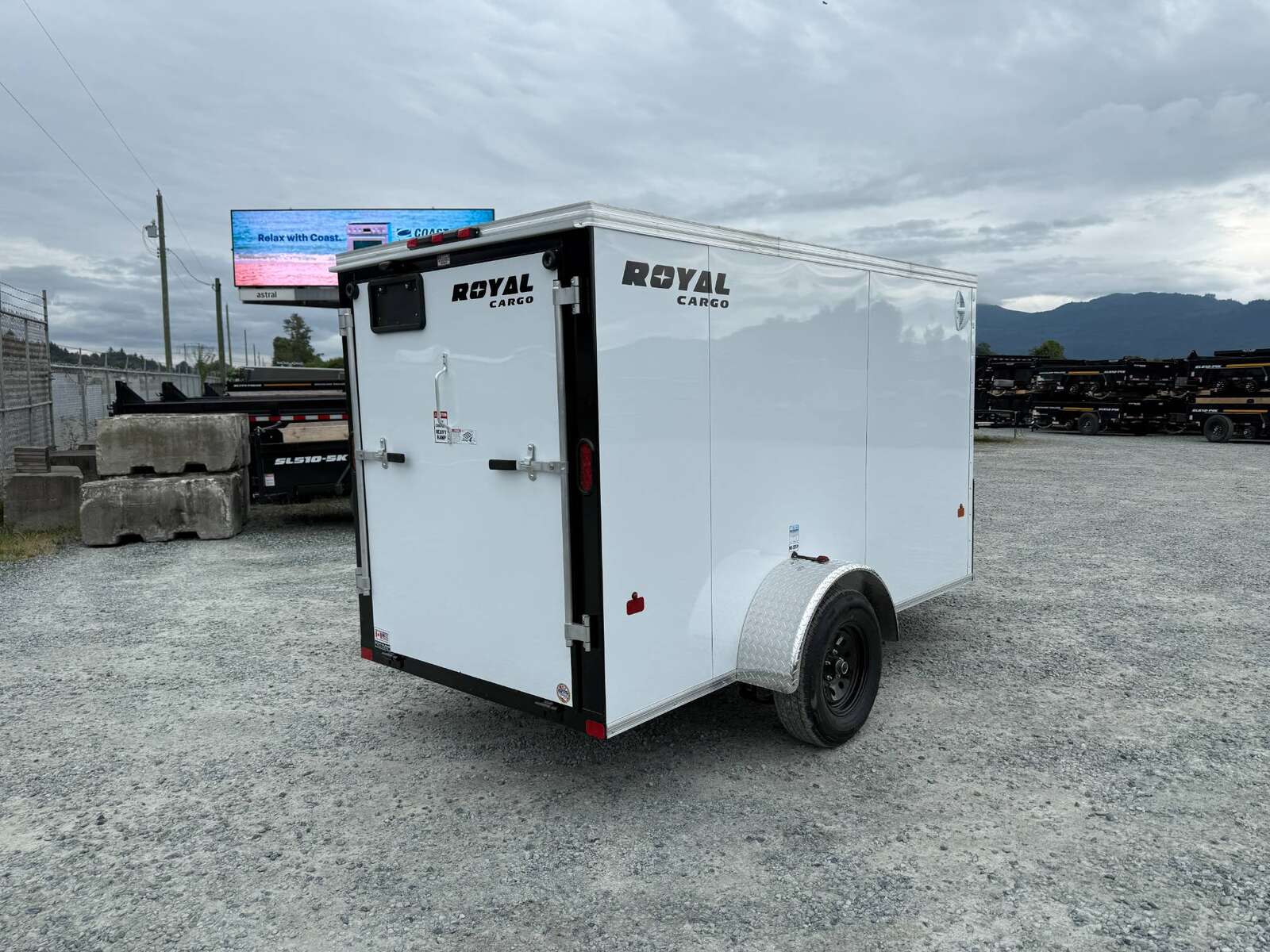 Photo of 2026 Royal Cargo 5x10 Cargo Enclosed Trailer V Nose Ramp Door White 2900lb GVW