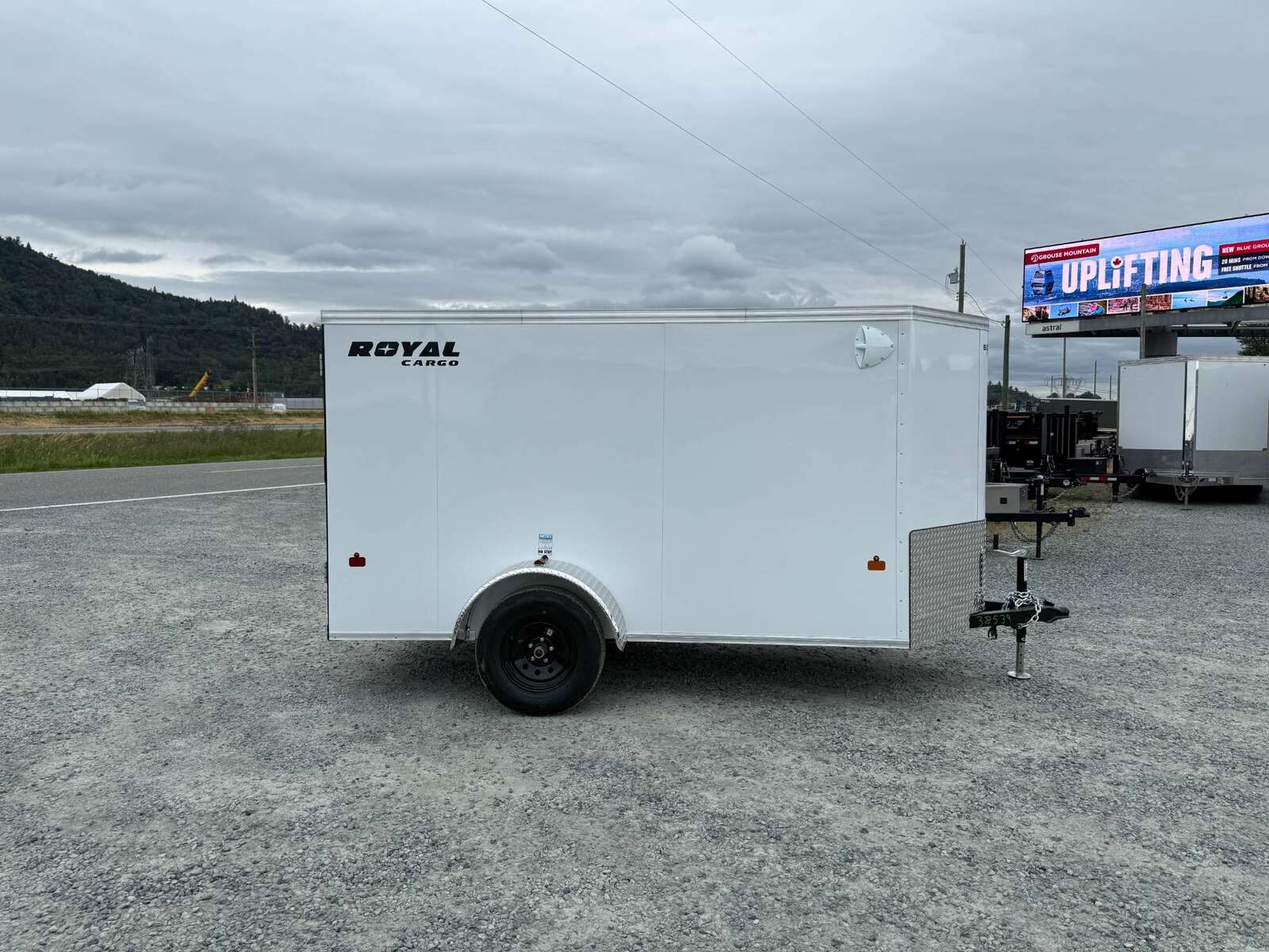 Photo of 2026 Royal Cargo 5x10 Cargo Enclosed Trailer V Nose Ramp Door White 2900lb GVW