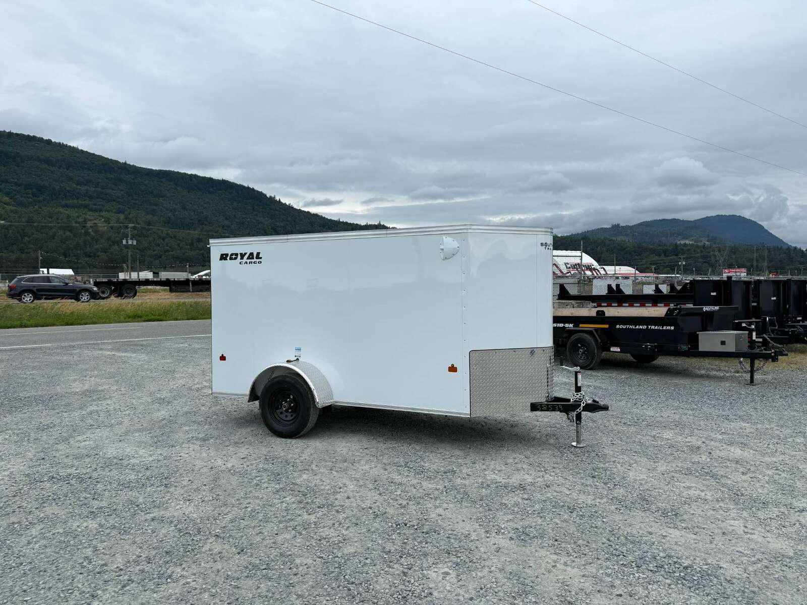 Photo of 2026 Royal Cargo 5x10 Cargo Enclosed Trailer V Nose Ramp Door White 2900lb GVW