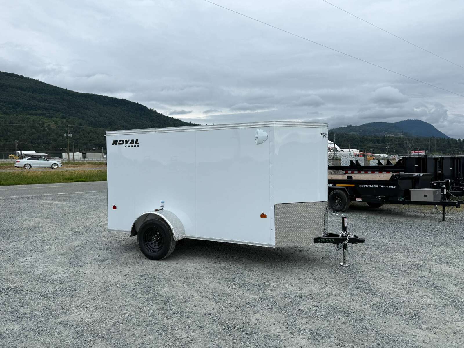 Photo of 2026 Royal Cargo 5x10 Cargo Enclosed Trailer V Nose Ramp Door White 2900lb GVW