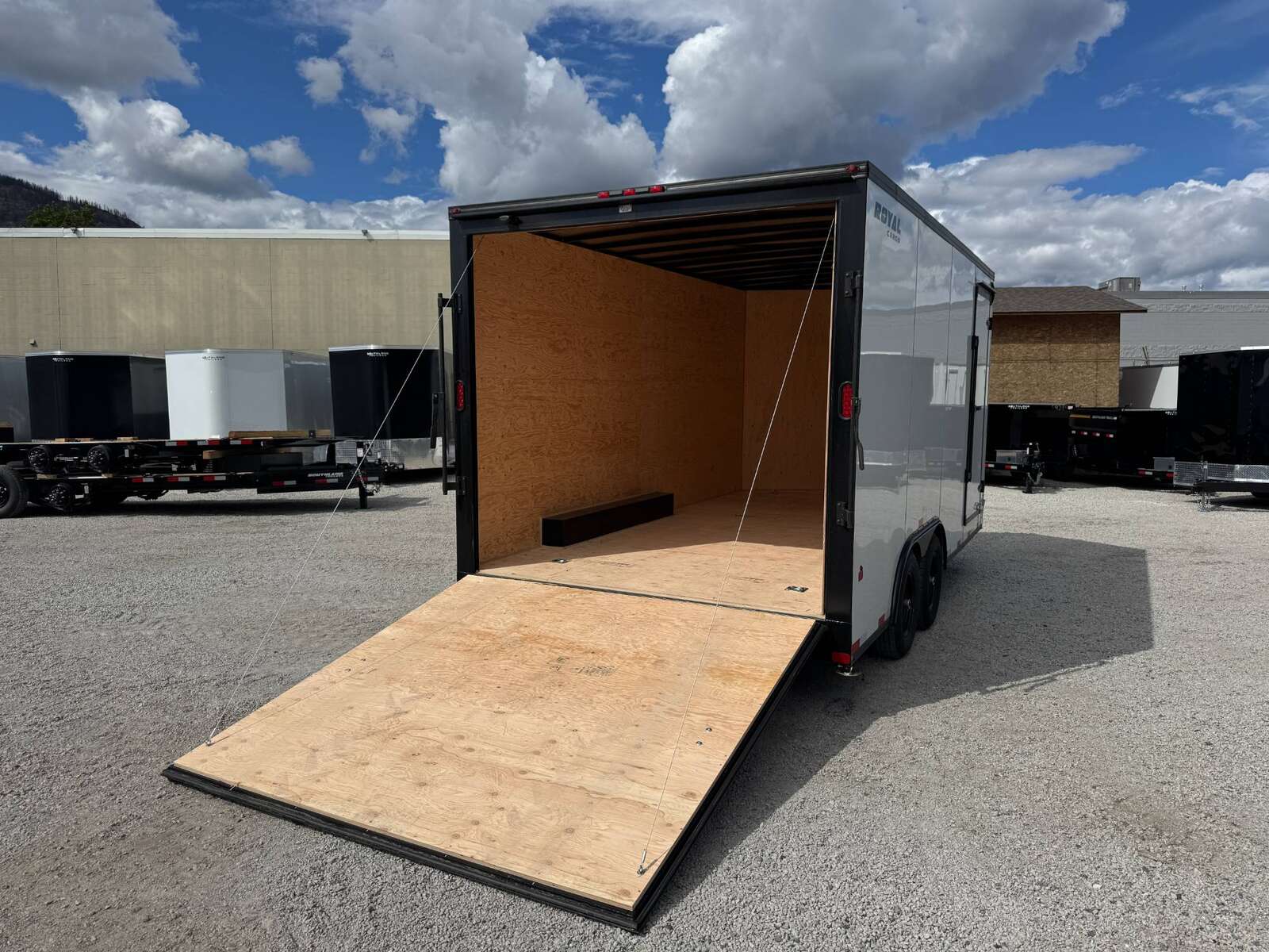 Photo of 2026 Royal Cargo 8.5X16 V NOSE Cargo / Enclosed Trailer White with Blackout Package RAMP DOOR EXTRA HEIGHT 11,400LB GVW