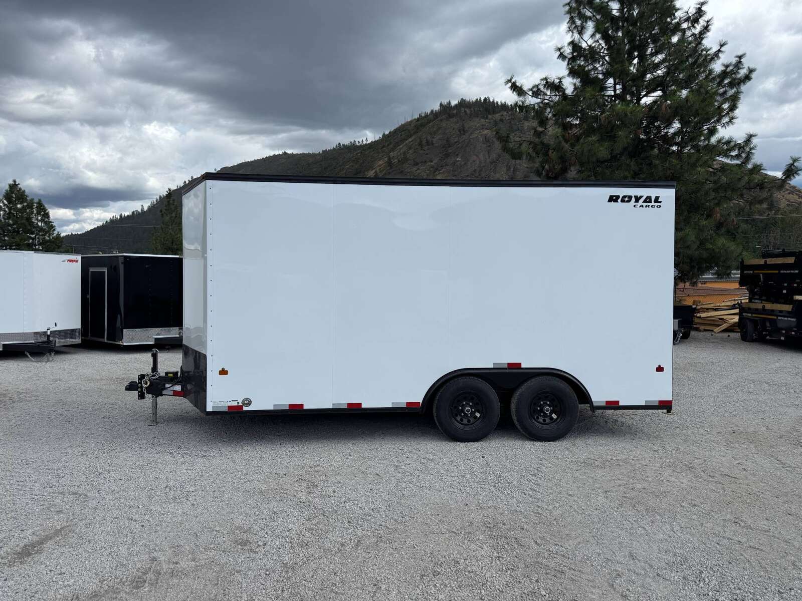 Photo of 2026 Royal Cargo 8.5X16 V NOSE Cargo / Enclosed Trailer White with Blackout Package RAMP DOOR EXTRA HEIGHT 11,400LB GVW