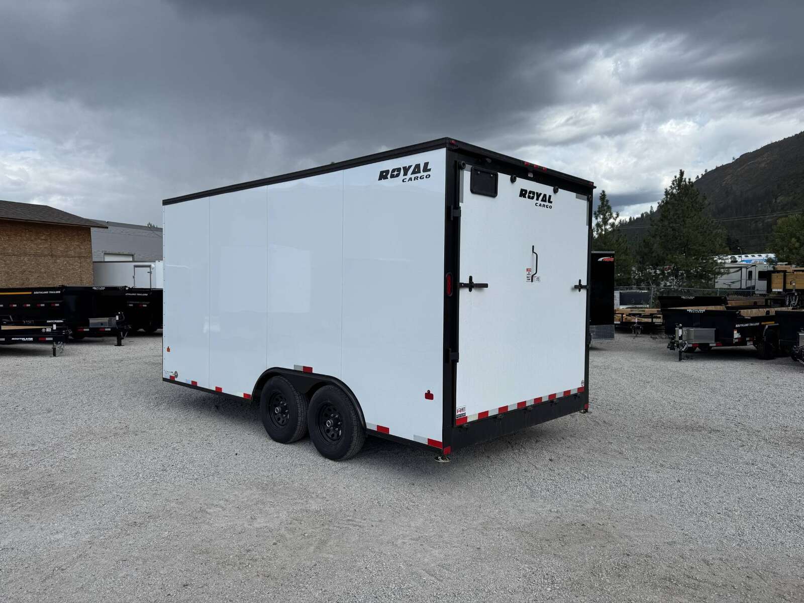 Photo of 2026 Royal Cargo 8.5X16 V NOSE Cargo / Enclosed Trailer White with Blackout Package RAMP DOOR EXTRA HEIGHT 11,400LB GVW