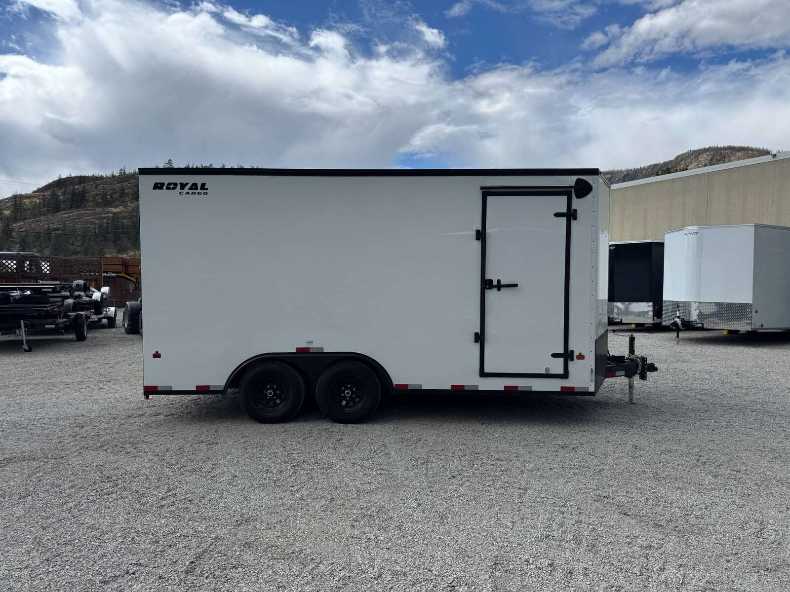 Photo of 2026 Royal Cargo 8.5X16 V NOSE Cargo / Enclosed Trailer White with Blackout Package RAMP DOOR EXTRA HEIGHT 11,400LB GVW