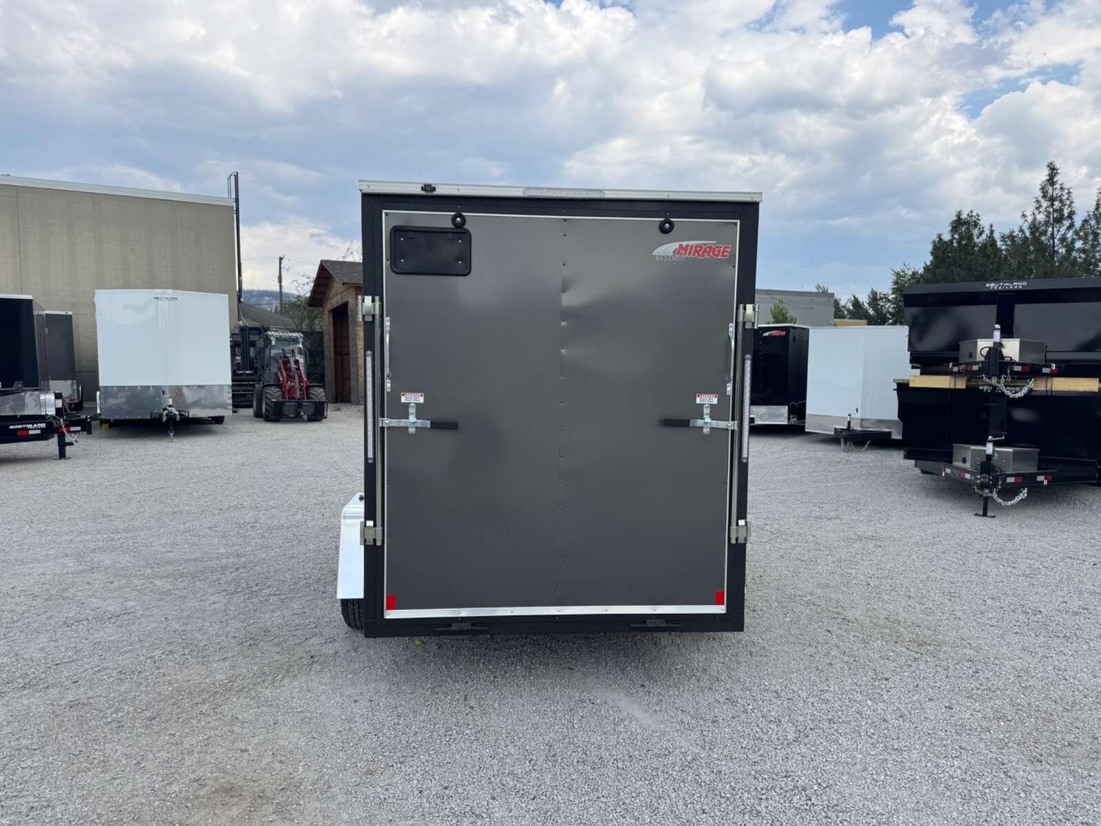 Photo of 2026 Mirage XE 6x10 V Nose Enclosed Cargo Trailer Ramp Door Charcoal Grey Extra Height 2990lb GVW