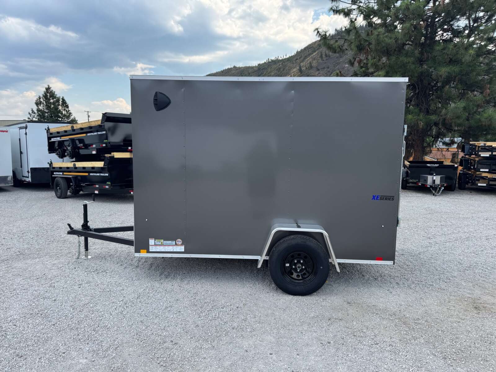 Photo of 2026 Mirage XE 6x10 V Nose Enclosed Cargo Trailer Ramp Door Charcoal Grey Extra Height 2990lb GVW