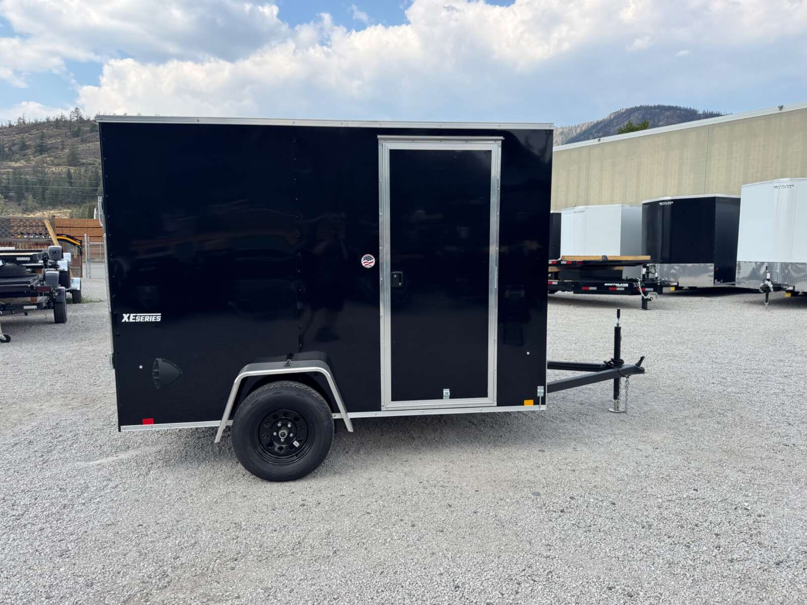 Photo of 2026 Mirage XE 6x10 V Nose Enclosed Cargo Trailer Ramp Door Black Extra Height 2990lb GVW