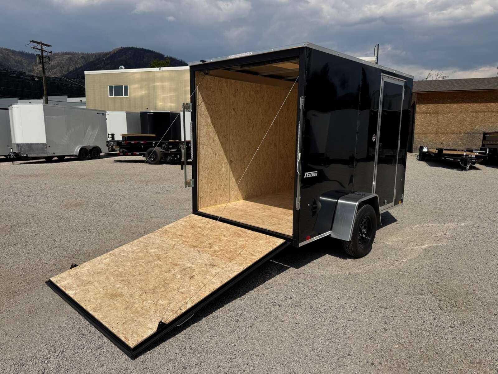 Photo of 2026 Mirage XE 6x10 V Nose Enclosed Cargo Trailer Ramp Door Black Extra Height 2990lb GVW
