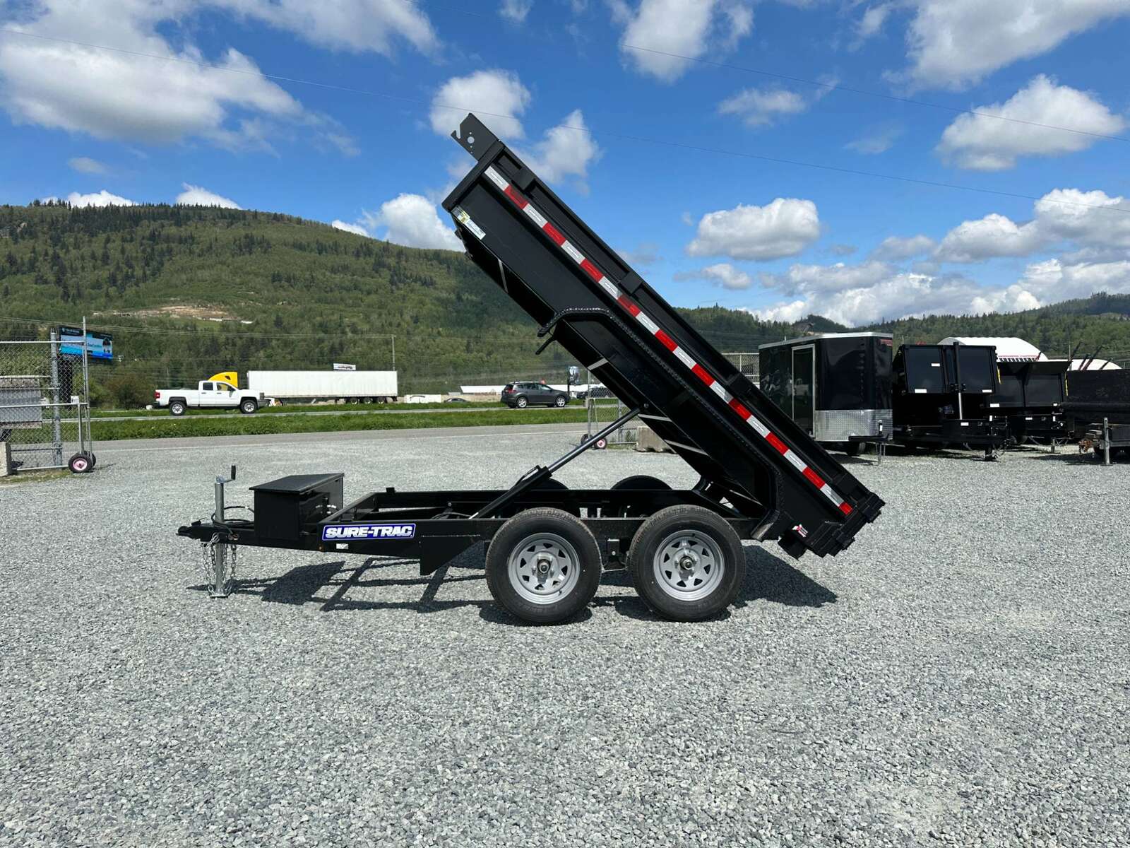 Photo of 2025 Suretrac 5x10 Dump Trailer 7000lb GVW Barn Doors
