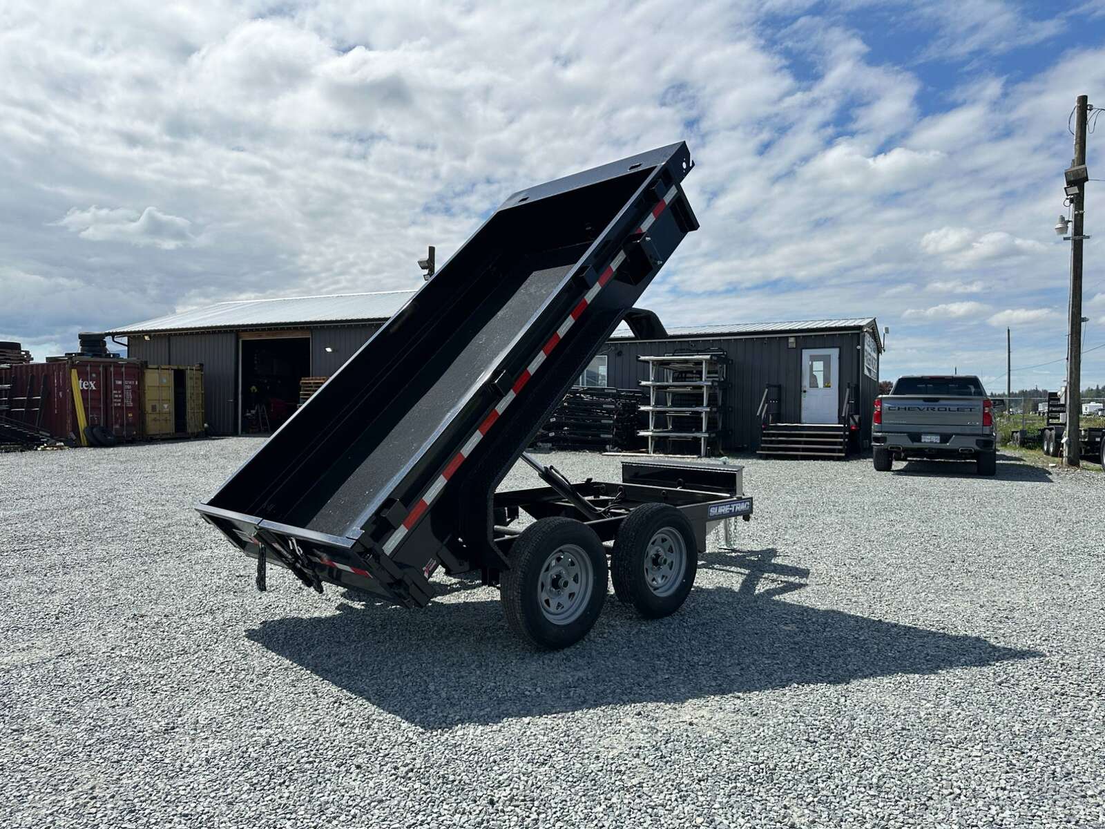 Photo of 2025 Suretrac 5x10 Dump Trailer 7000lb GVW Barn Doors