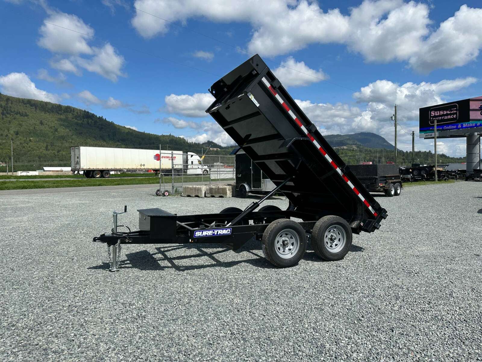 Photo of 2025 Suretrac 5x10 Dump Trailer 7000lb GVW Barn Doors