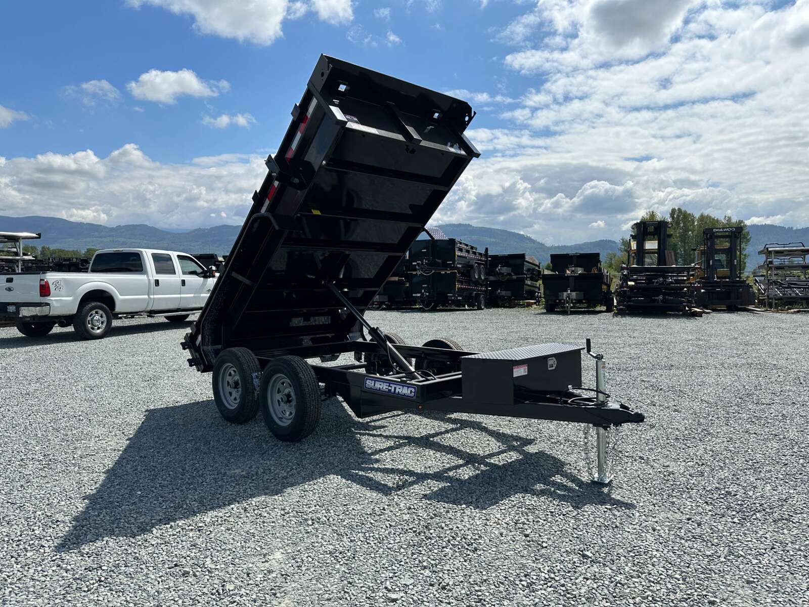 Photo of 2025 Suretrac 5x10 Dump Trailer 7000lb GVW Barn Doors