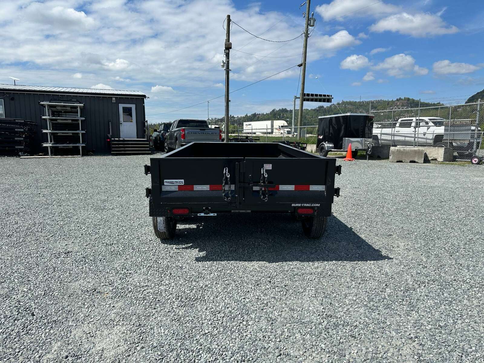 Photo of 2025 Suretrac 5x10 Dump Trailer 7000lb GVW Barn Doors