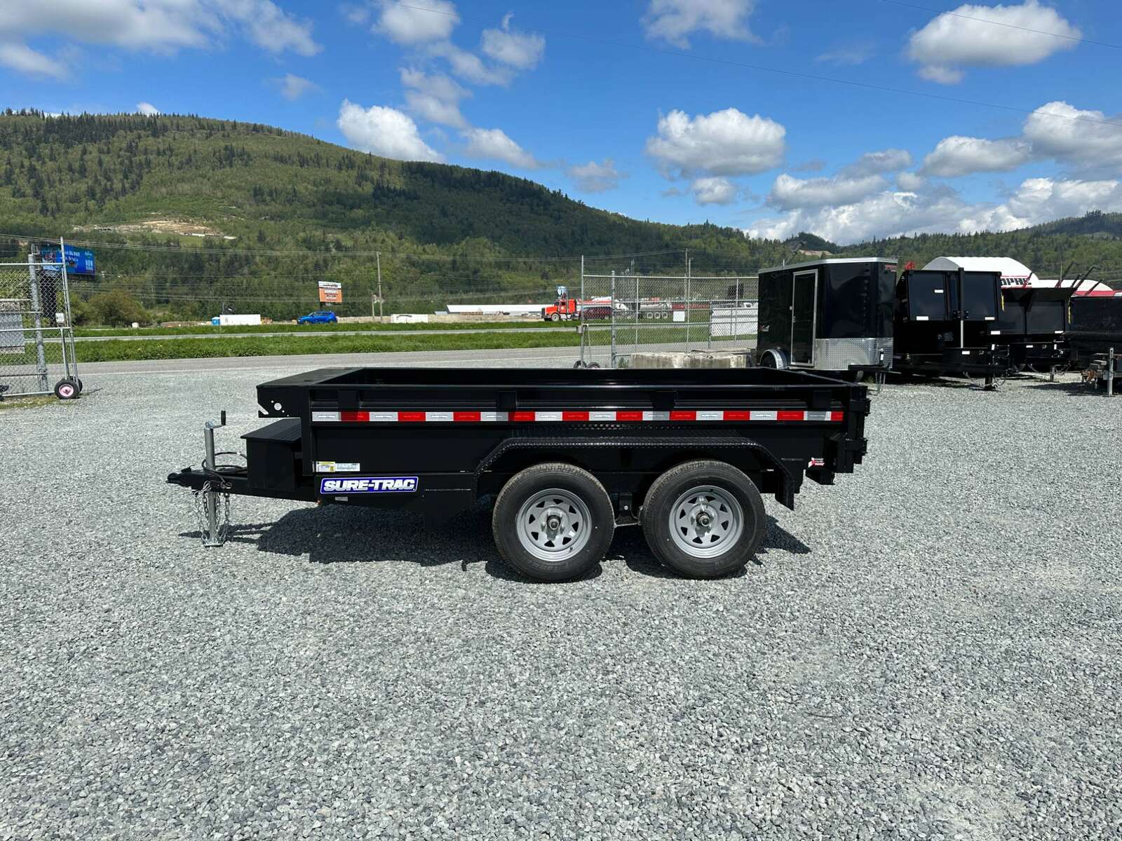 Photo of 2025 Suretrac 5x10 Dump Trailer 7000lb GVW Barn Doors
