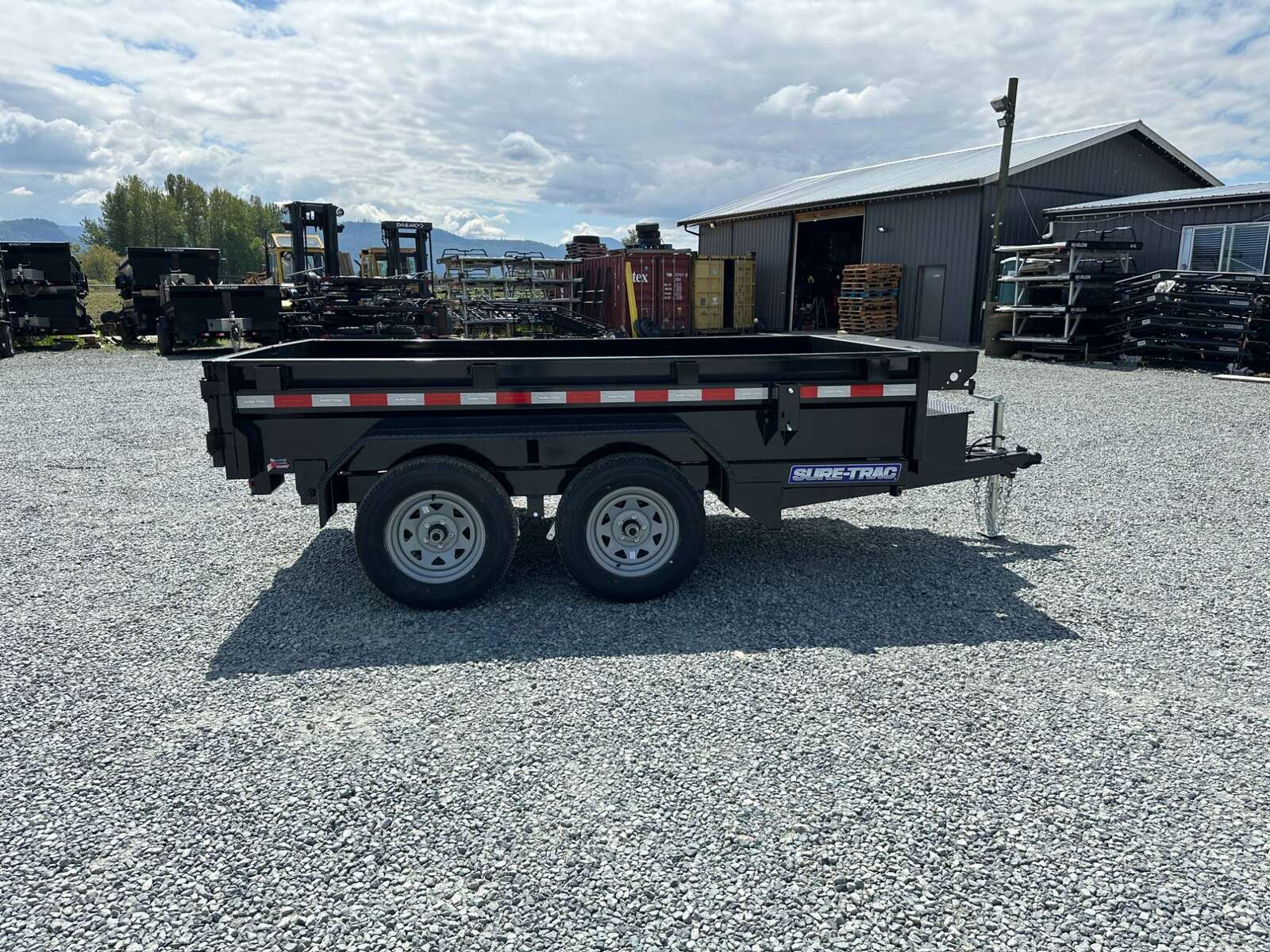 Photo of 2025 Suretrac 5x10 Dump Trailer 7000lb GVW Barn Doors