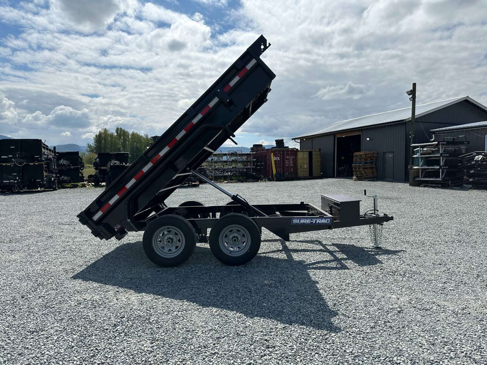 Photo of 2025 Suretrac 5x10 Dump Trailer 7000lb GVW Barn Doors