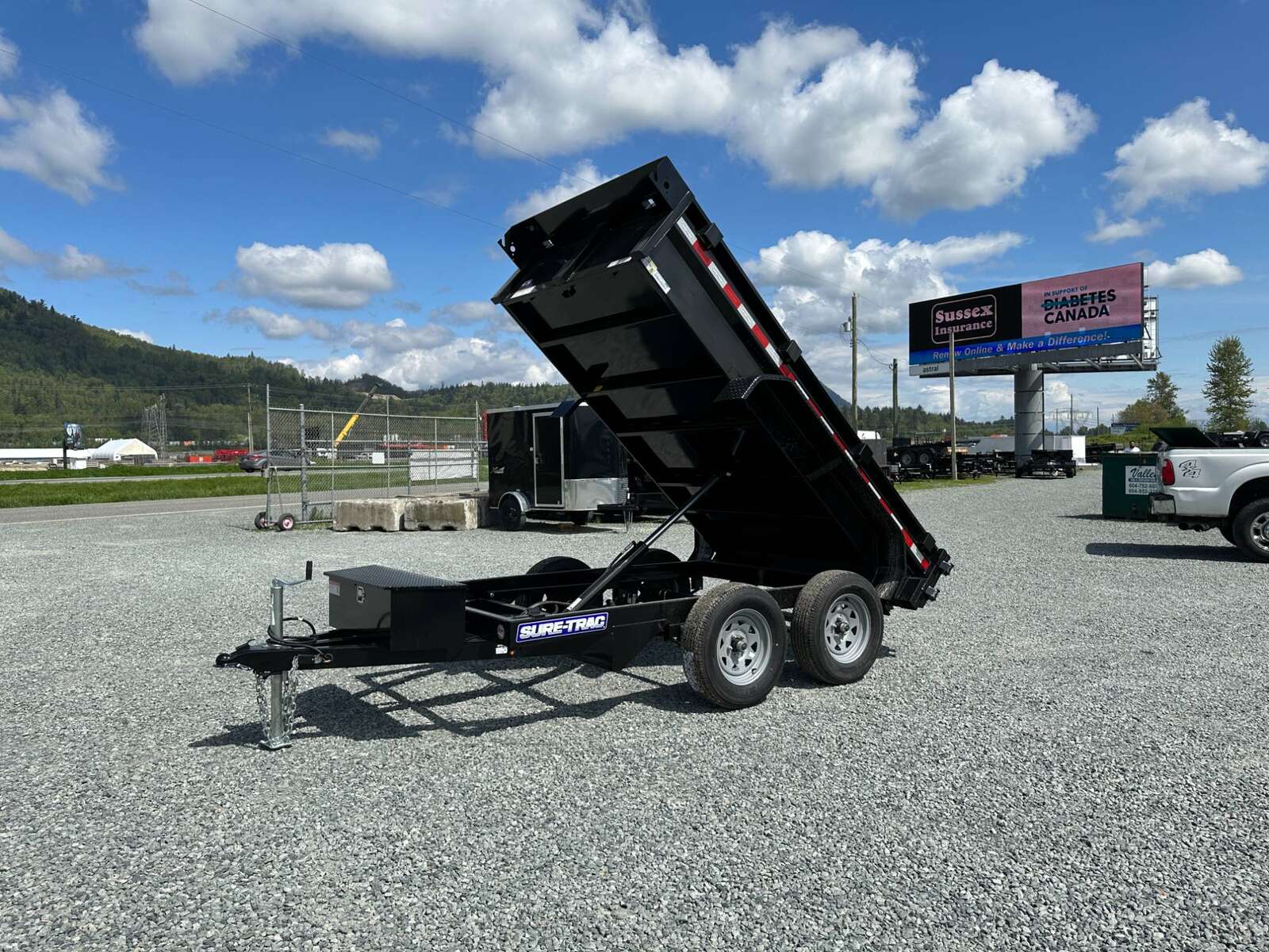 Photo of 2025 Suretrac 5x10 Dump Trailer 7000lb GVW Barn Doors