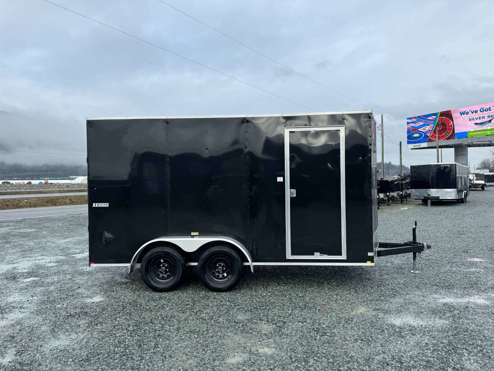 Photo of 2026 Mirage XE 7X14 V-Nose Ramp Door Cargo / Enclosed Trailer Extra Height Black 7000lb GVW
