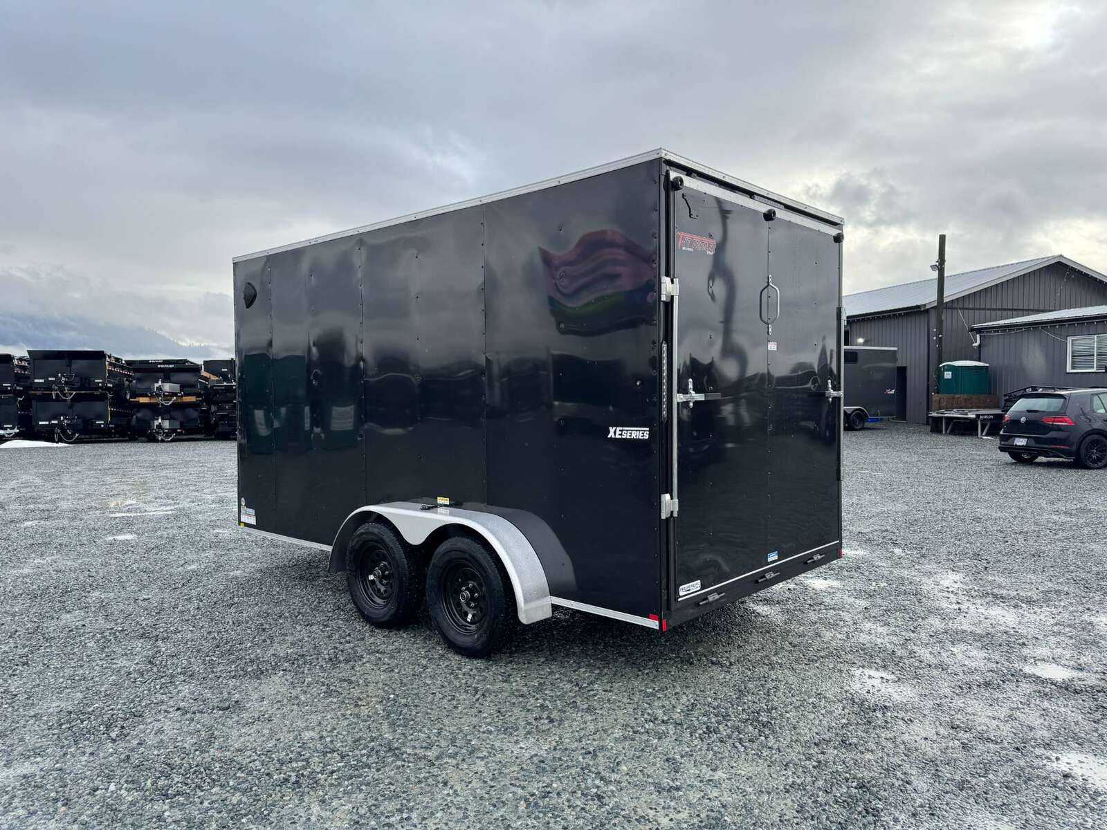 Photo of 2026 Mirage XE 7X14 V-Nose Ramp Door Cargo / Enclosed Trailer Extra Height Black 7000lb GVW
