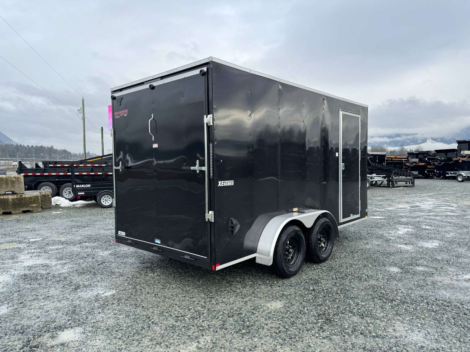 Photo of 2026 Mirage XE 7X14 V-Nose Ramp Door Cargo / Enclosed Trailer Extra Height Black 7000lb GVW