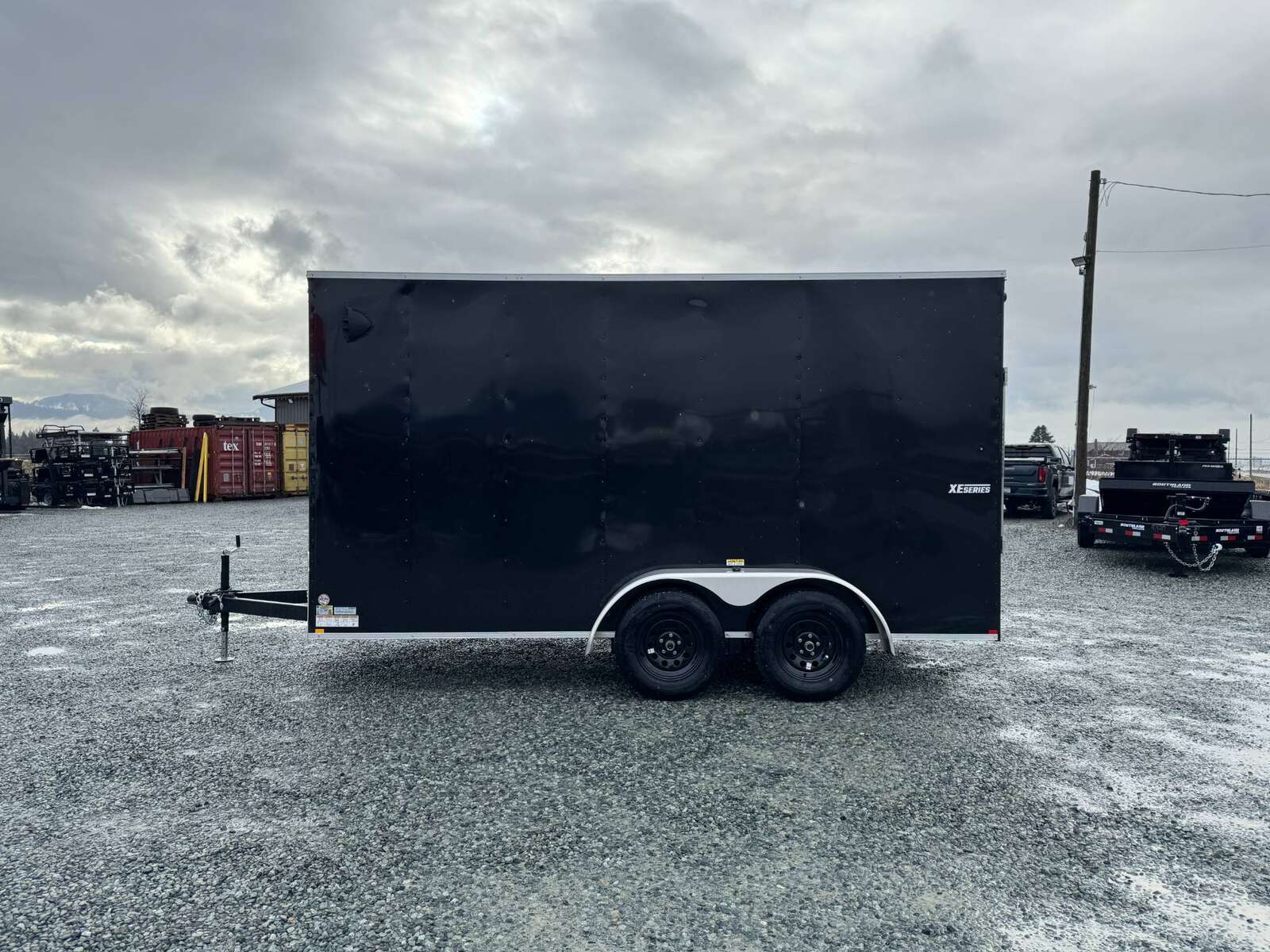 Photo of 2026 Mirage XE 7X14 V-Nose Ramp Door Cargo / Enclosed Trailer Extra Height Black 7000lb GVW