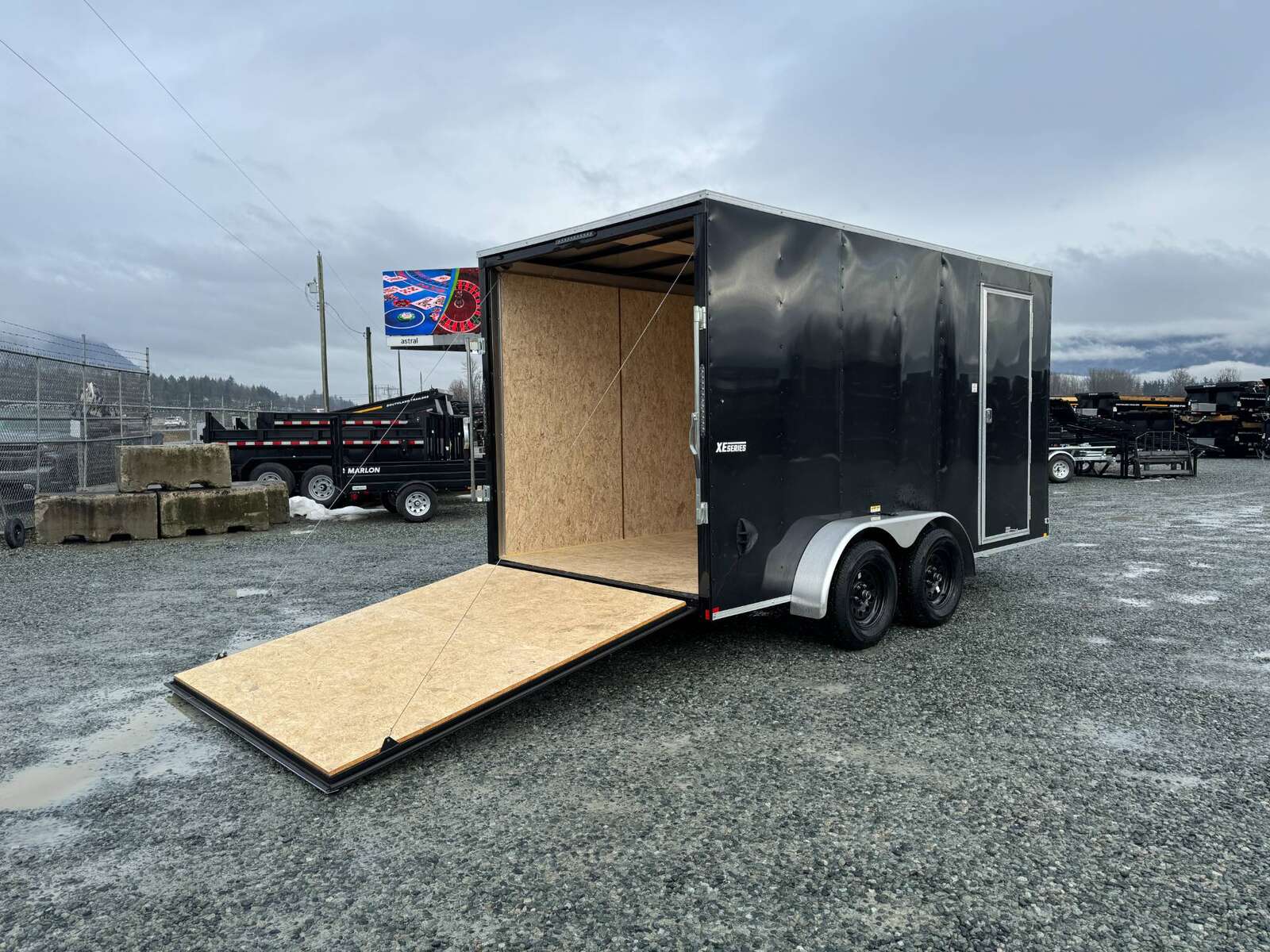 Photo of 2026 Mirage XE 7X14 V-Nose Ramp Door Cargo / Enclosed Trailer Extra Height Black 7000lb GVW