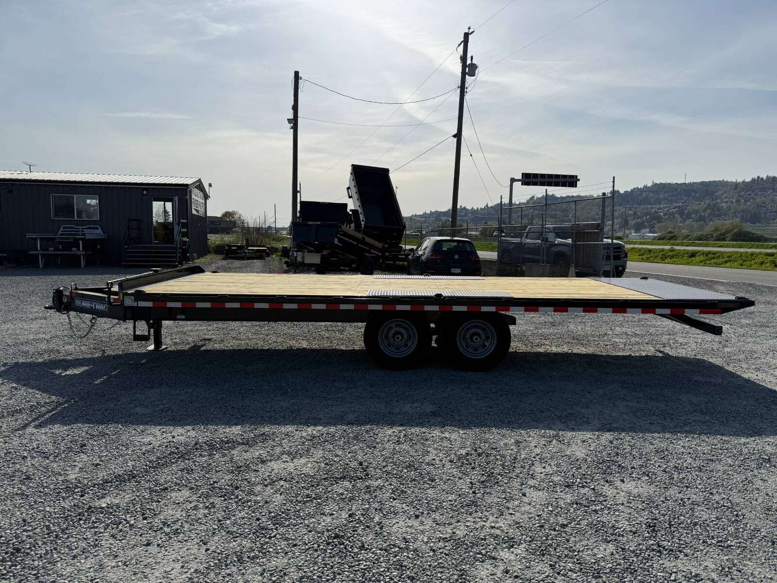 Photo of 2025 Suretrac 8.5x22ft Deck Over Power Tilt Equipment Trailer 15,000lb GVW
