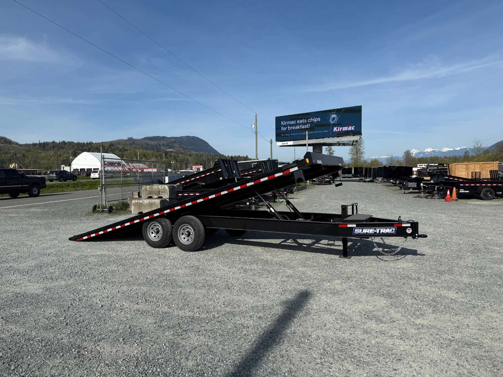 Photo of 2025 Suretrac 8.5x22ft Deck Over Power Tilt Equipment Trailer 15,000lb GVW
