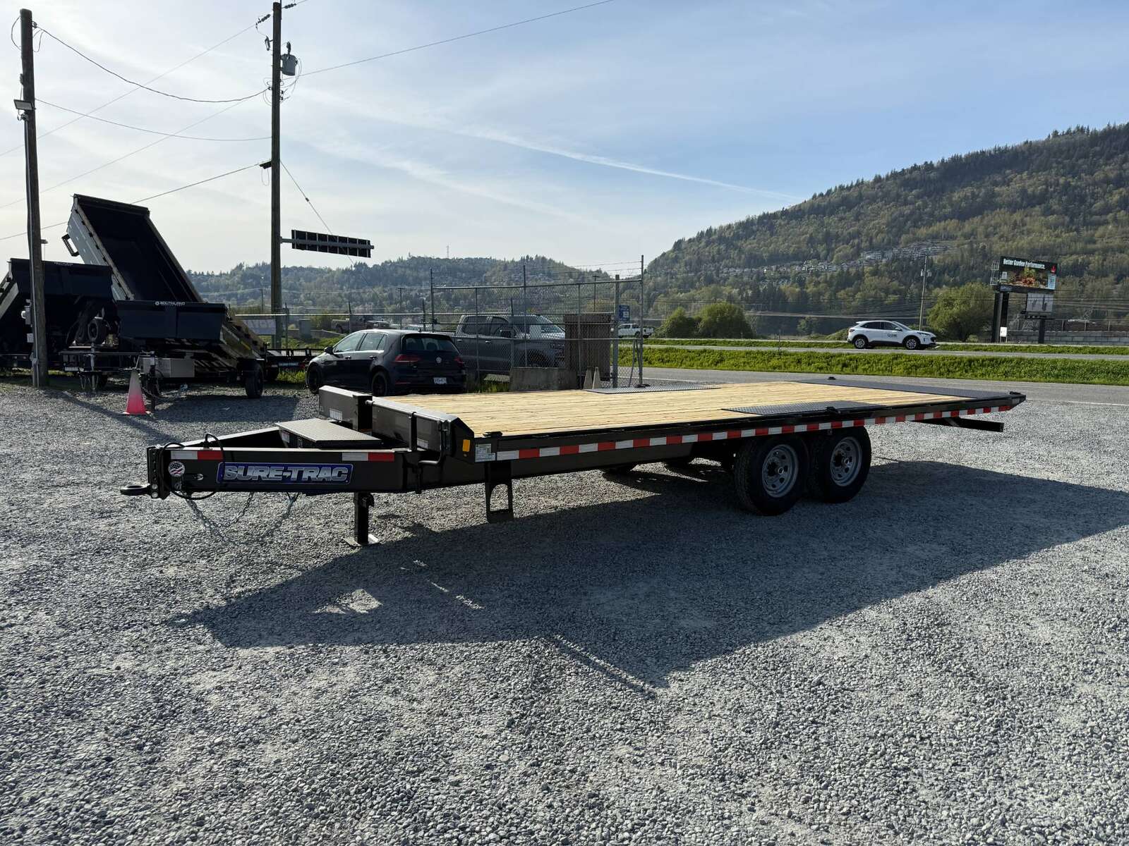 Photo of 2025 Suretrac 8.5x22ft Deck Over Power Tilt Equipment Trailer 15,000lb GVW