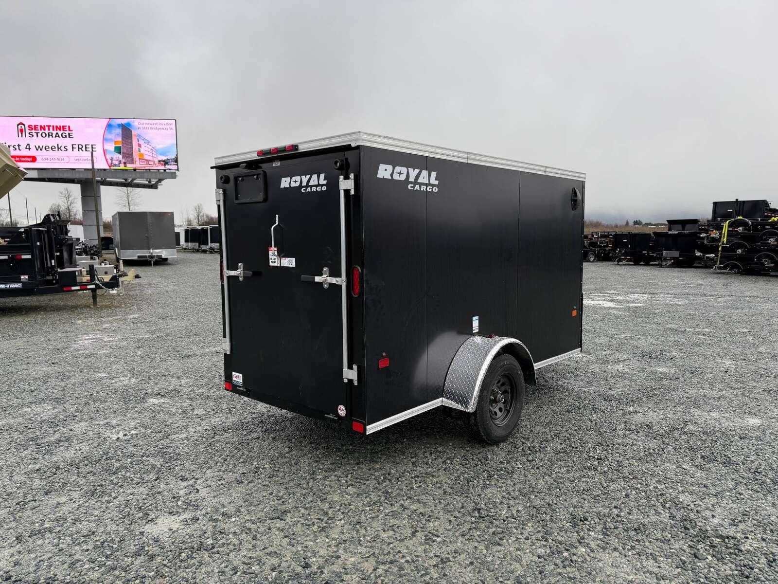 Photo of 2026 Royal Cargo 5x10 Cargo Enclosed Trailer V Nose Ramp Door Black 2900lb GVW