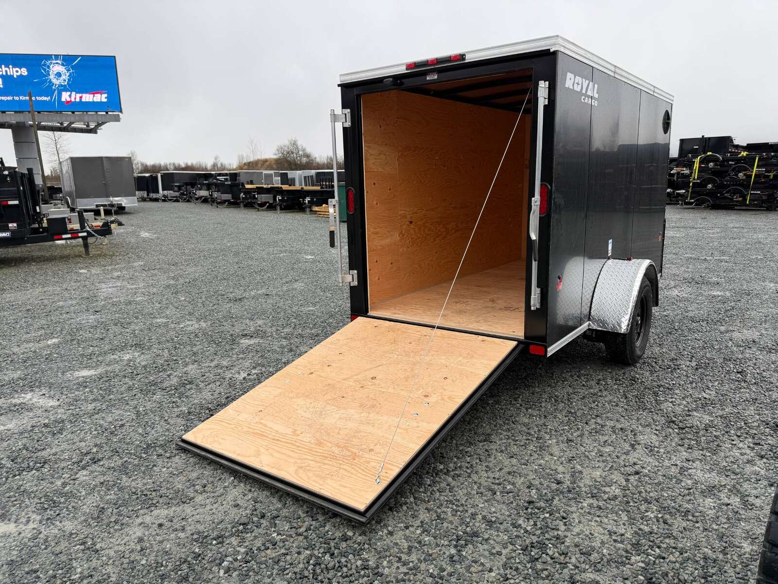 Photo of 2026 Royal Cargo 5x10 Cargo Enclosed Trailer V Nose Ramp Door Black 2900lb GVW