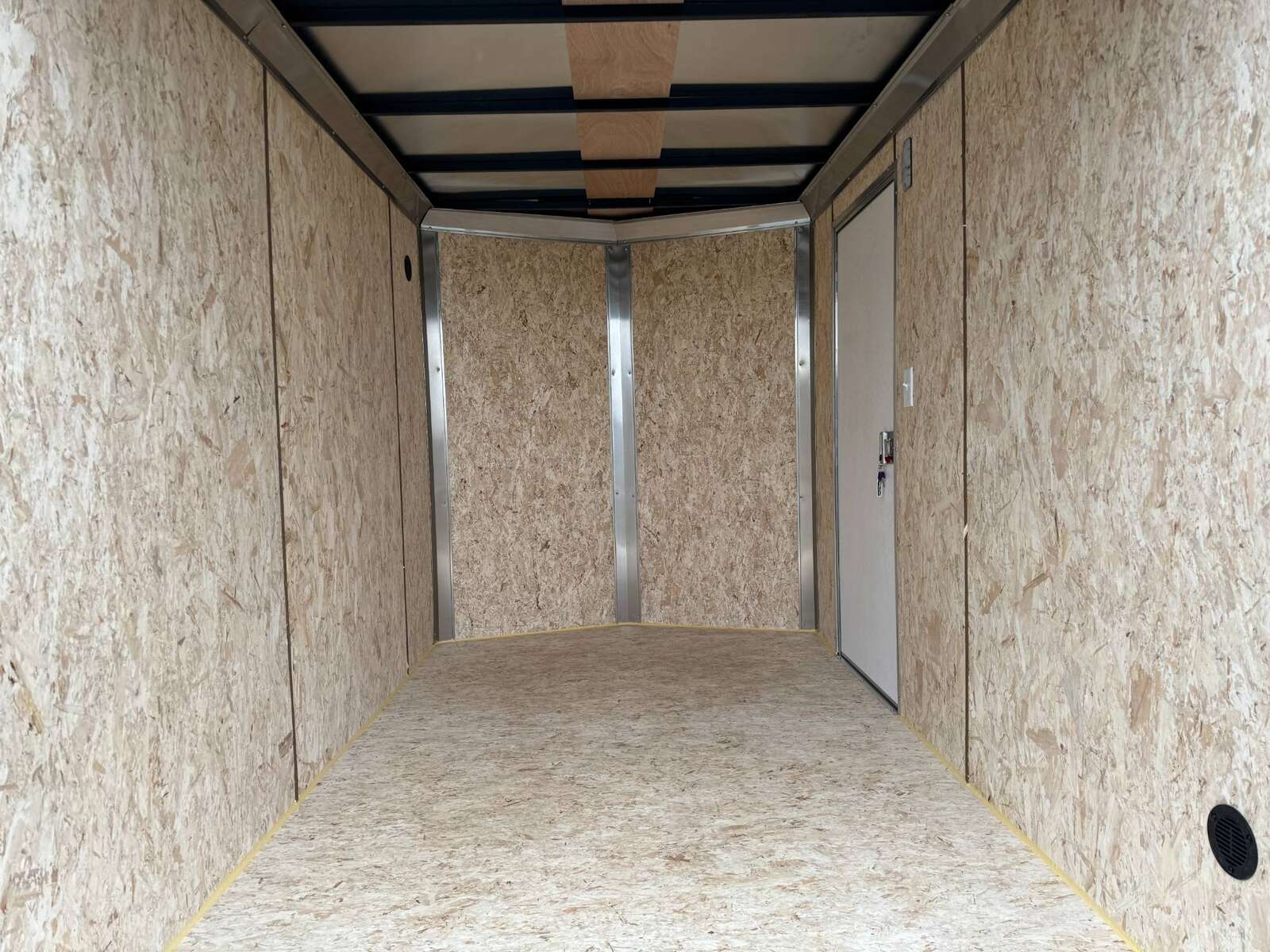 Photo of 2026 Mirage XE 6x10 V Nose Enclosed Cargo Trailer Barn Doors Black Extra Height 2990lb GVW