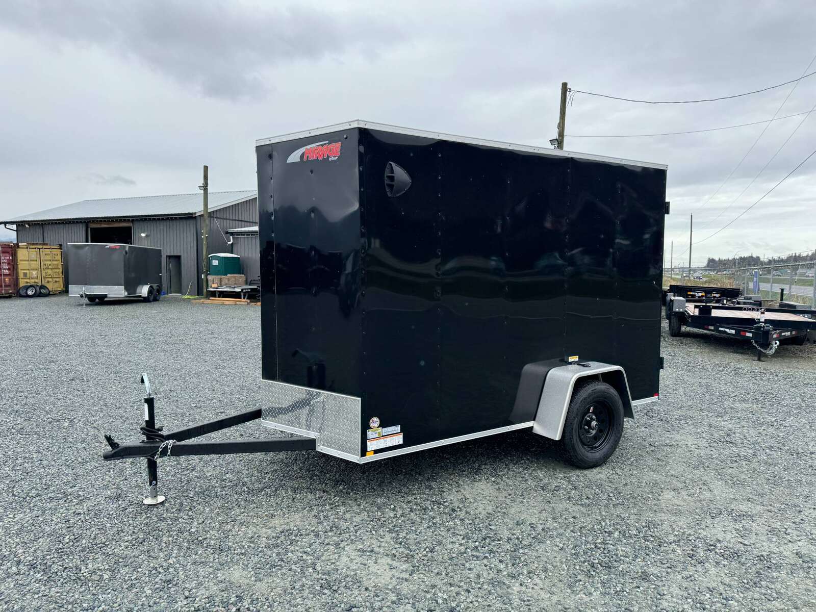 Photo of 2026 Mirage XE 6x10 V Nose Enclosed Cargo Trailer Barn Doors Black Extra Height 2990lb GVW