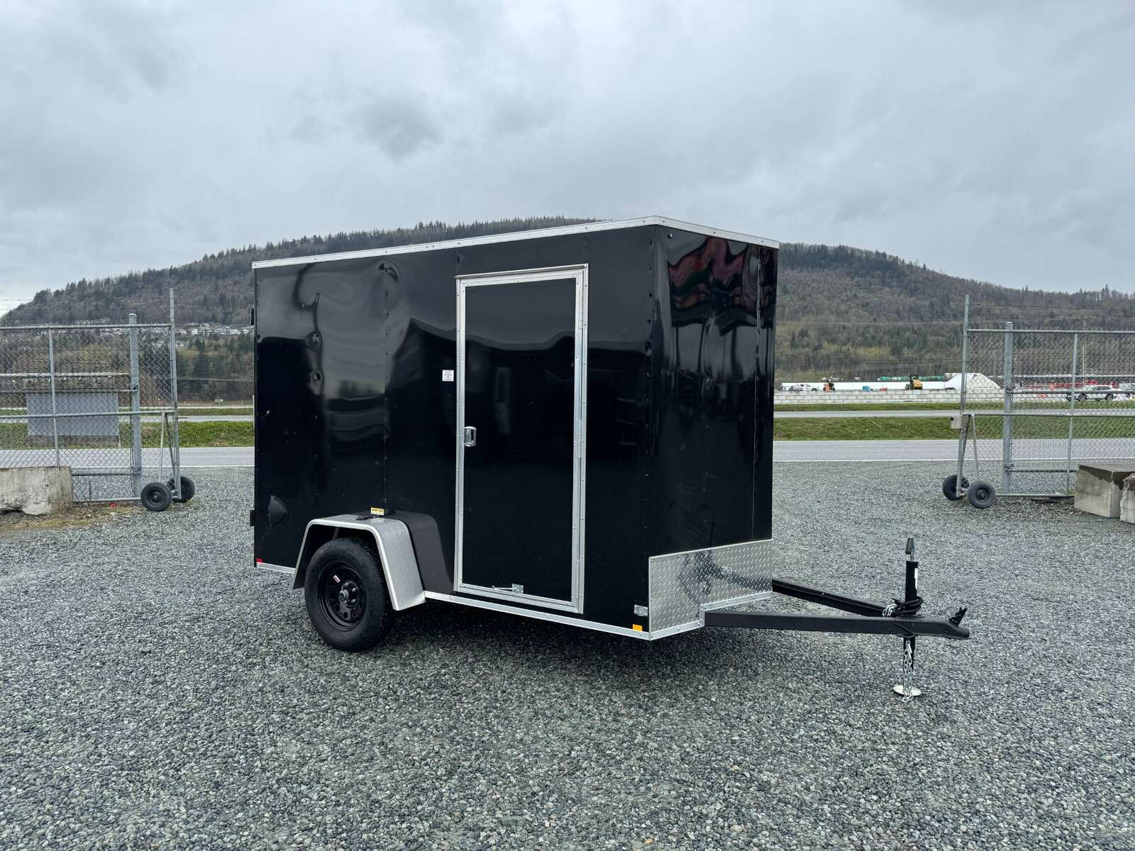 Photo of 2026 Mirage XE 6x10 V Nose Enclosed Cargo Trailer Barn Doors Black Extra Height 2990lb GVW