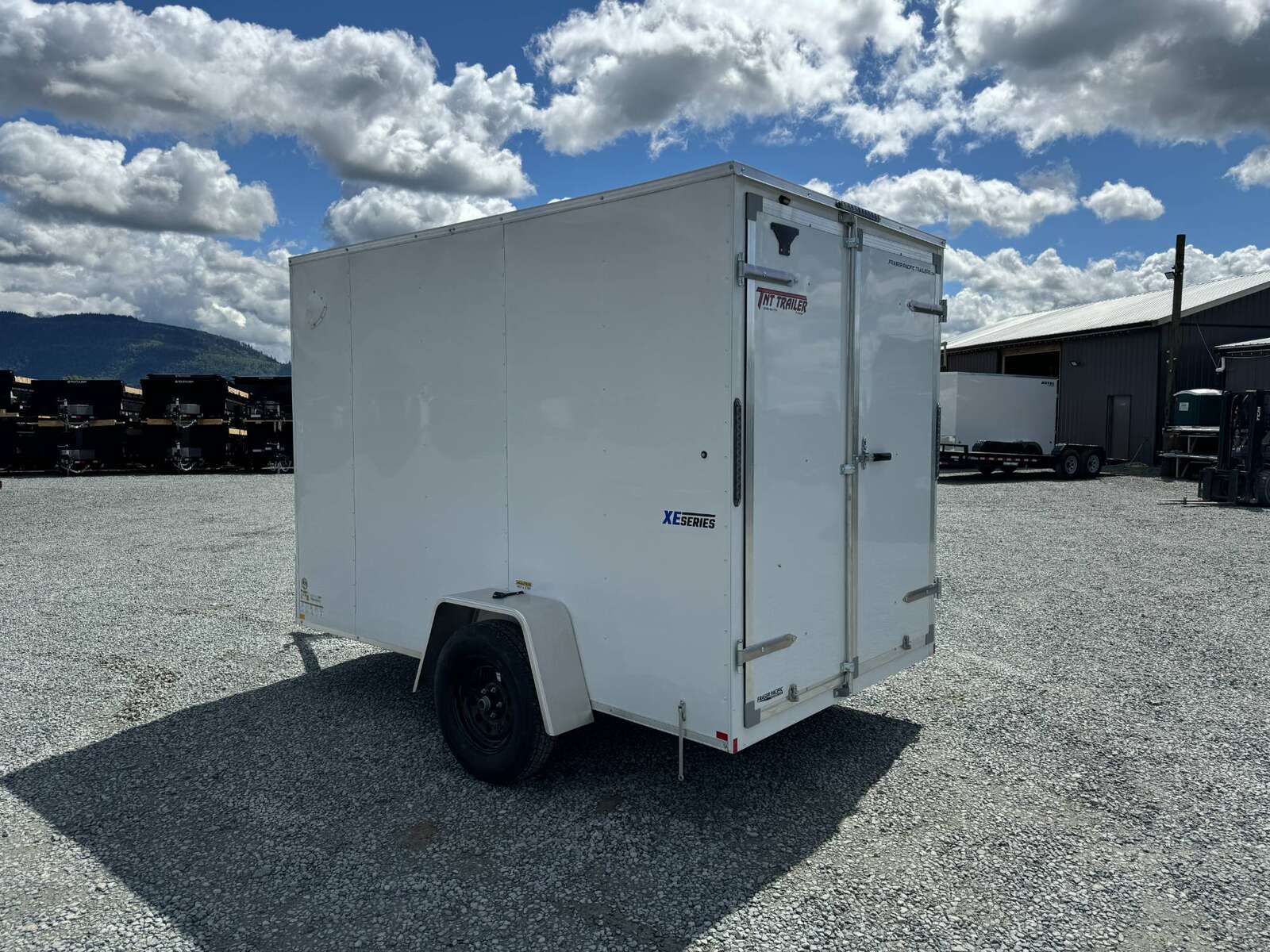 Photo of 2026 Mirage XE 6x10 V Nose Enclosed Cargo Trailer Barn Doors White Extra Height 2990lb GVW