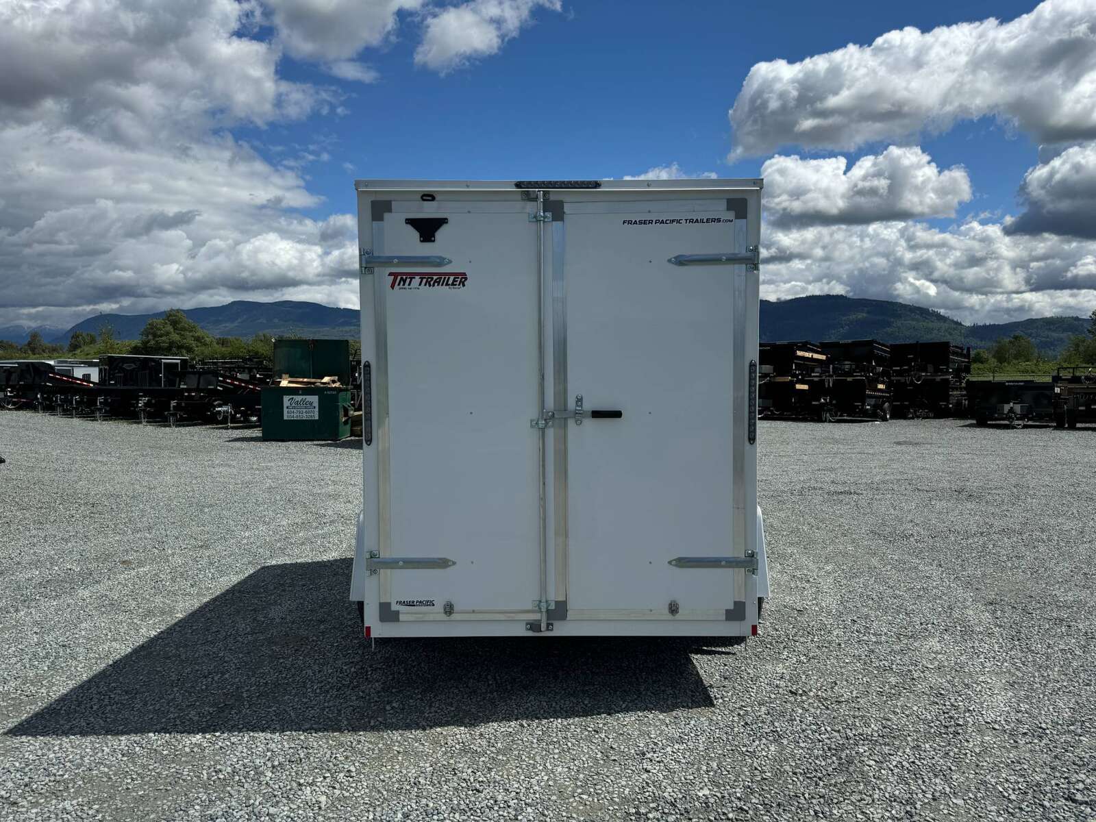 Photo of 2026 Mirage XE 6x10 V Nose Enclosed Cargo Trailer Barn Doors White Extra Height 2990lb GVW