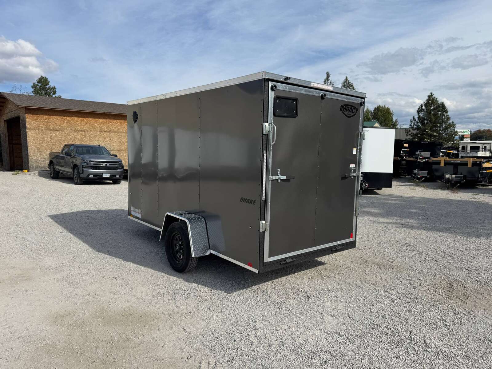 Photo of 2026 Impact Quake 6x12 V Nose Cargo / Enclosed Trailer Charcoal Grey Ramp Door Extra Height 2990lb GVW