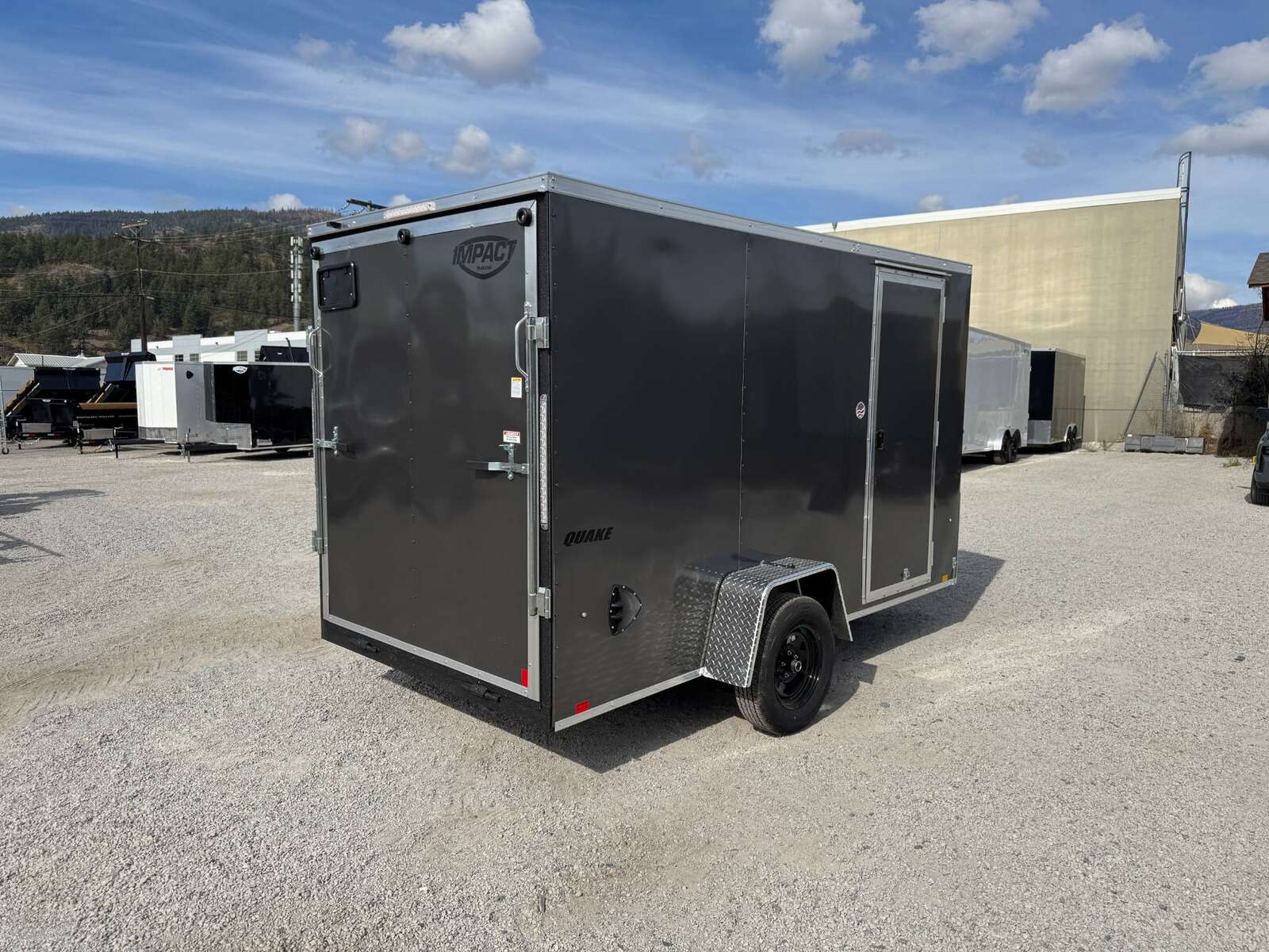 Photo of 2026 Impact Quake 6x12 V Nose Cargo / Enclosed Trailer Charcoal Grey Ramp Door Extra Height 2990lb GVW