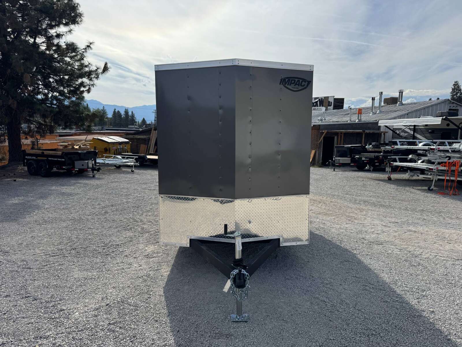 Photo of 2026 Impact Quake 6x12 V Nose Cargo / Enclosed Trailer Charcoal Grey Ramp Door Extra Height 2990lb GVW