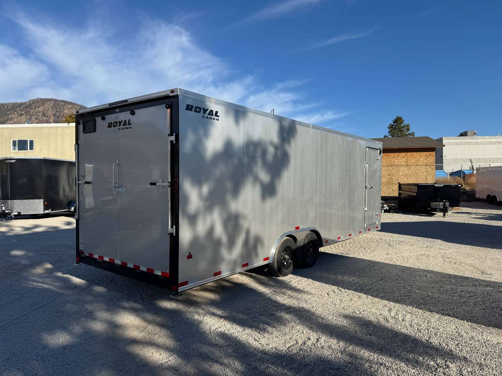 Photo of 2026 Royal Cargo 8.5x24 V Nose Car Hauler Cargo / Enclosed Trailer 11,400lb GVW Silver Ramp Door Extra Height