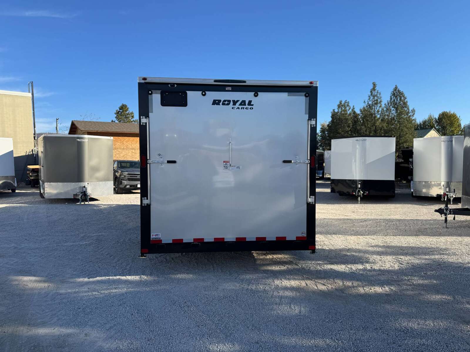 Photo of 2026 Royal Cargo 8.5x24 V Nose Car Hauler Cargo / Enclosed Trailer 11,400lb GVW Silver Ramp Door Extra Height