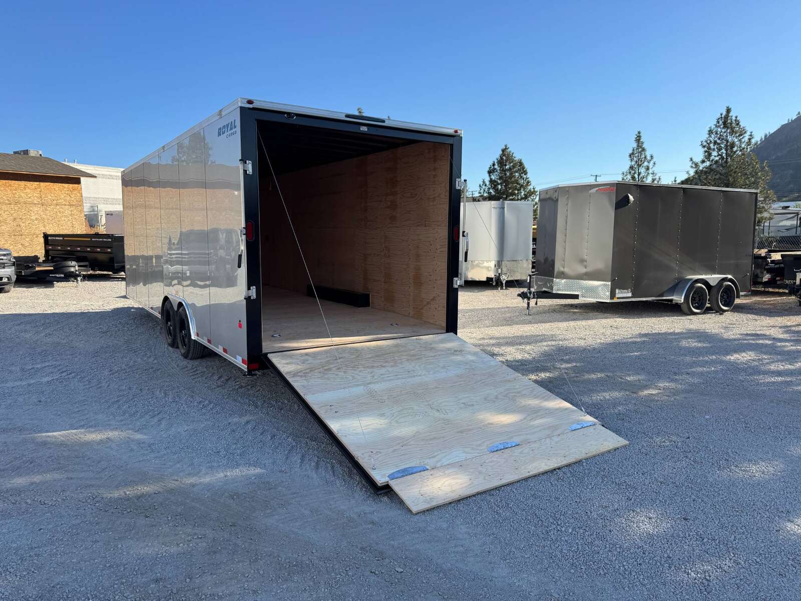 Photo of 2026 Royal Cargo 8.5x24 V Nose Car Hauler Cargo / Enclosed Trailer 11,400lb GVW Silver Ramp Door Extra Height