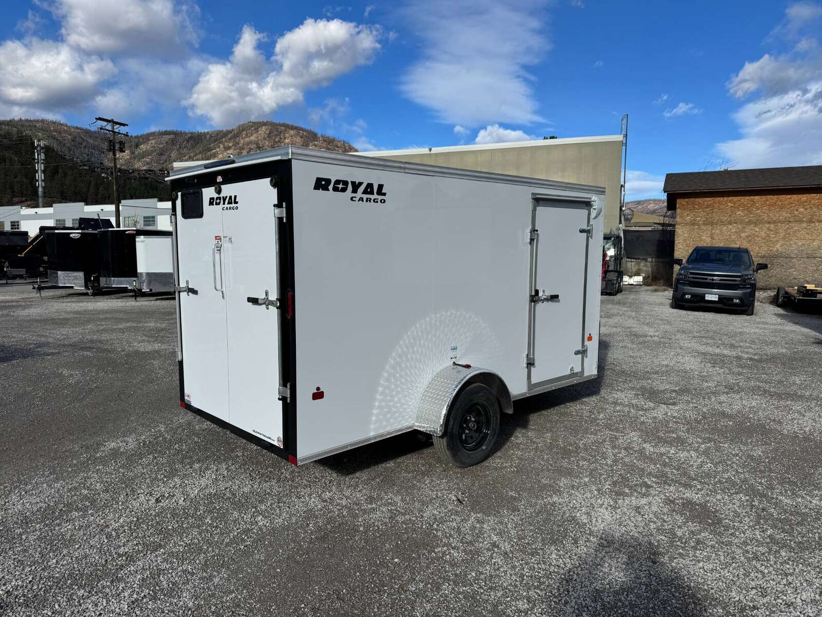 Photo of 2026 Royal Cargo 6x12 V Nose Cargo / Enclosed Trailer Ramp Door White 2999lb GVW