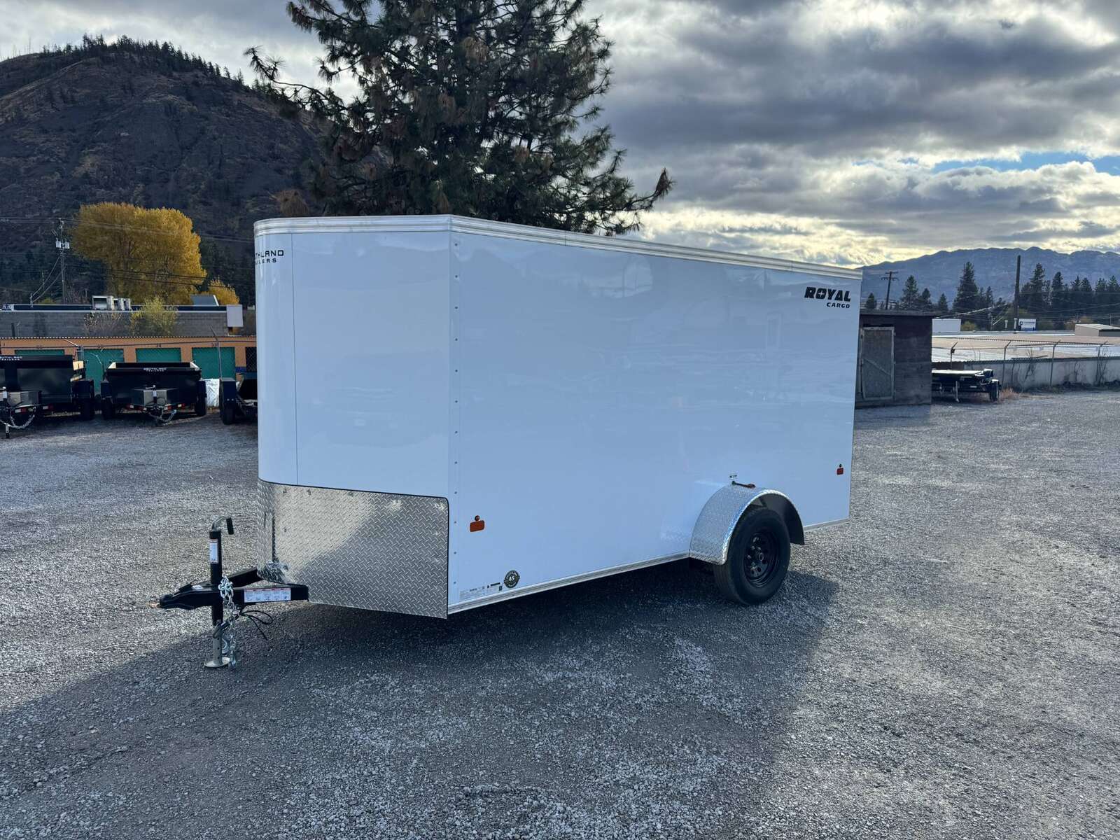 Photo of 2026 Royal Cargo 6x12 V Nose Cargo / Enclosed Trailer Ramp Door White 2999lb GVW