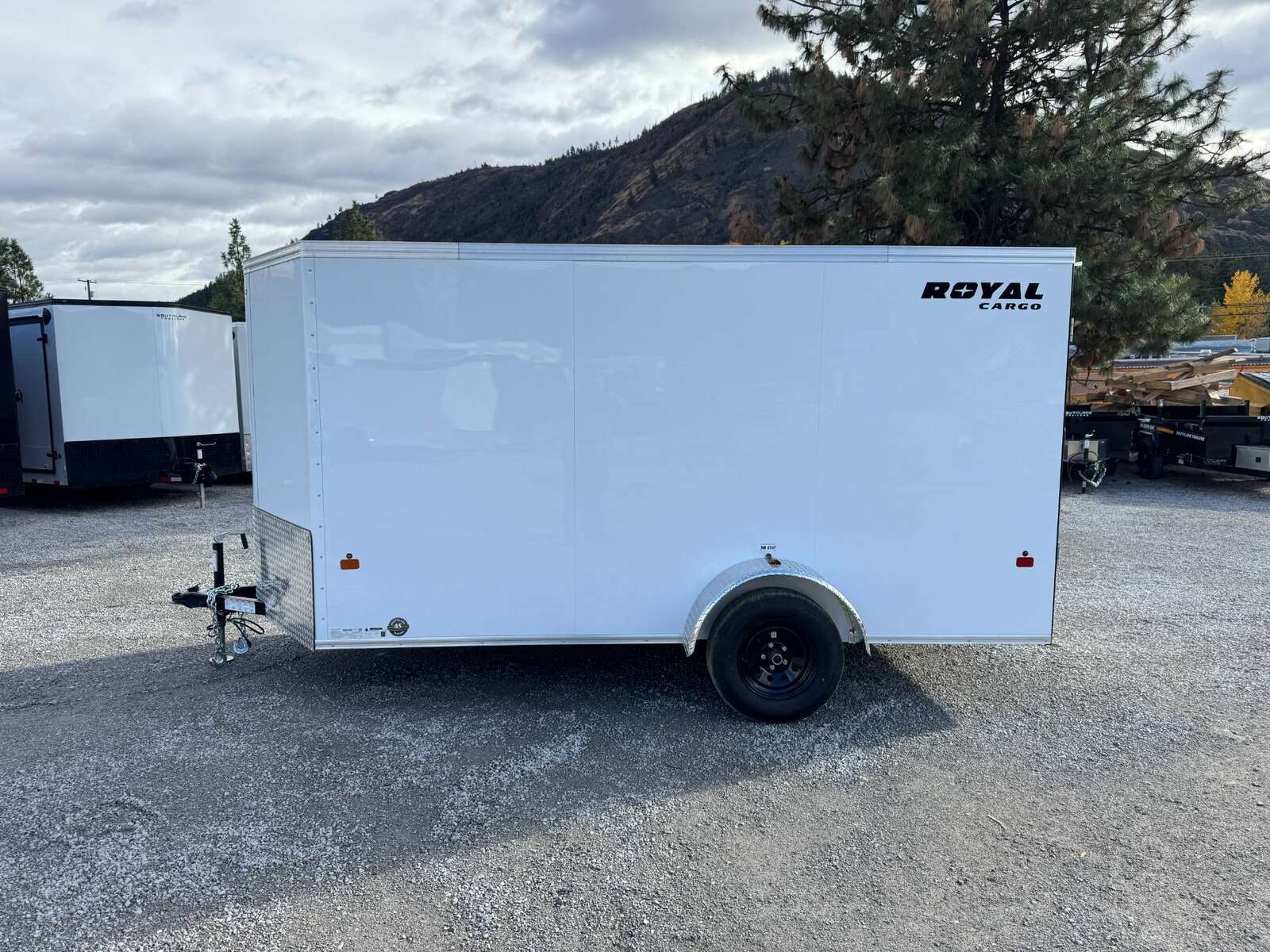 Photo of 2026 Royal Cargo 6x12 V Nose Cargo / Enclosed Trailer Ramp Door White 2999lb GVW