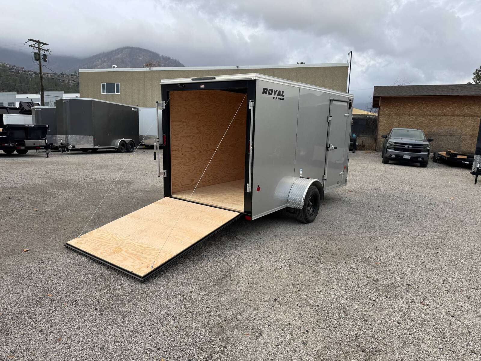 Photo of 2026 Royal Cargo 6x12 V Nose Cargo / Enclosed Trailer Ramp Door Silver 2999lb GVW