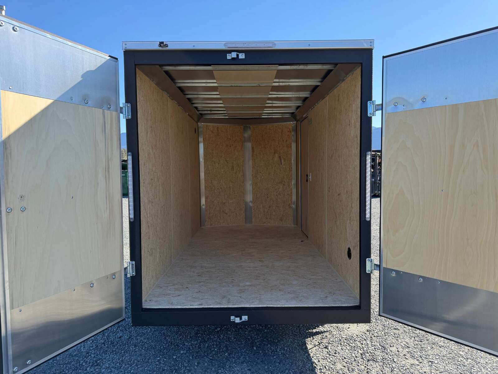 Photo of 2026 Impact Quake 6x12 V Nose Cargo / Enclosed Trailer Charcoal Grey Barn Door Extra Height 2990lb GVW