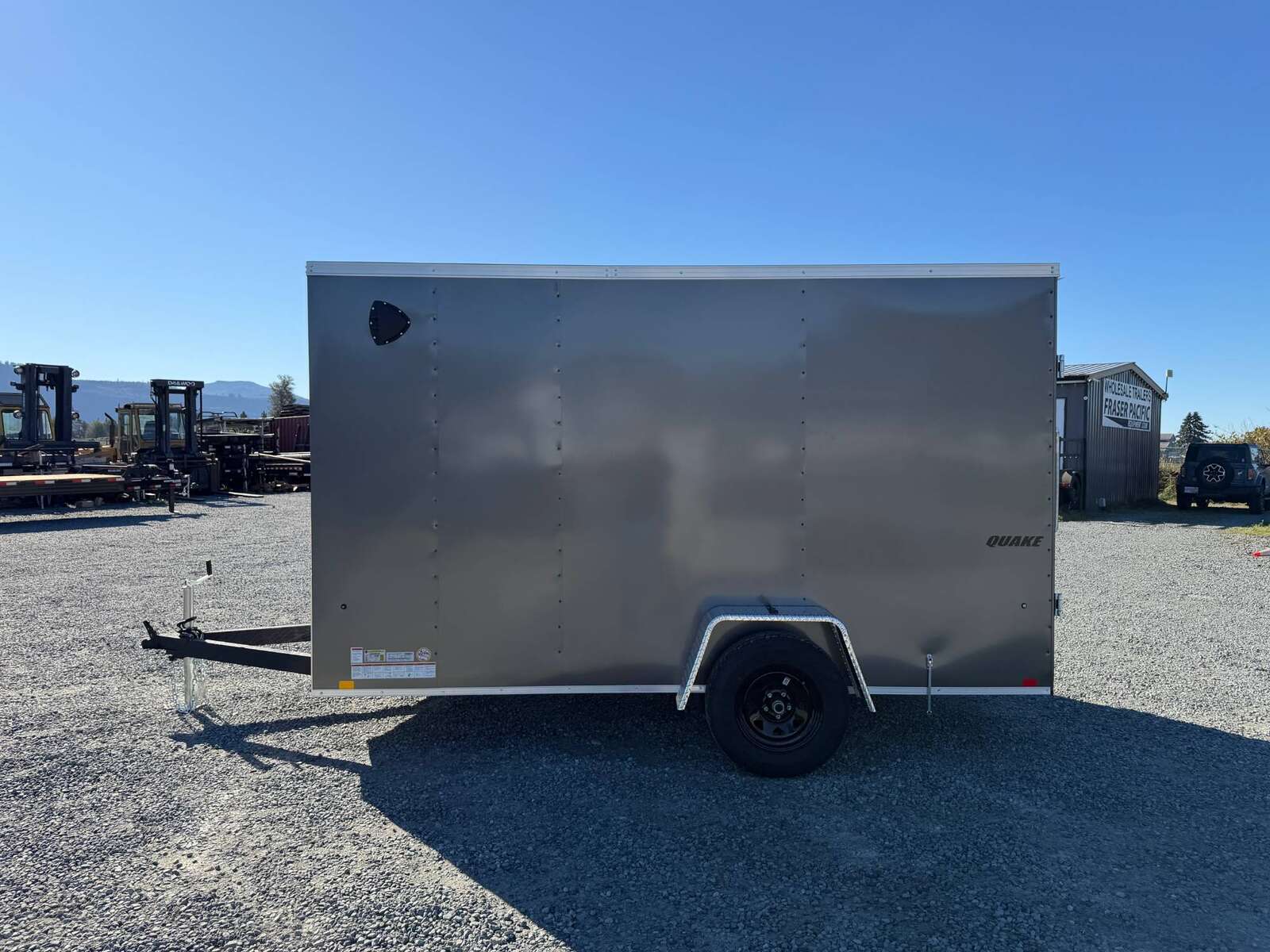 Photo of 2026 Impact Quake 6x12 V Nose Cargo / Enclosed Trailer Charcoal Grey Barn Door Extra Height 2990lb GVW