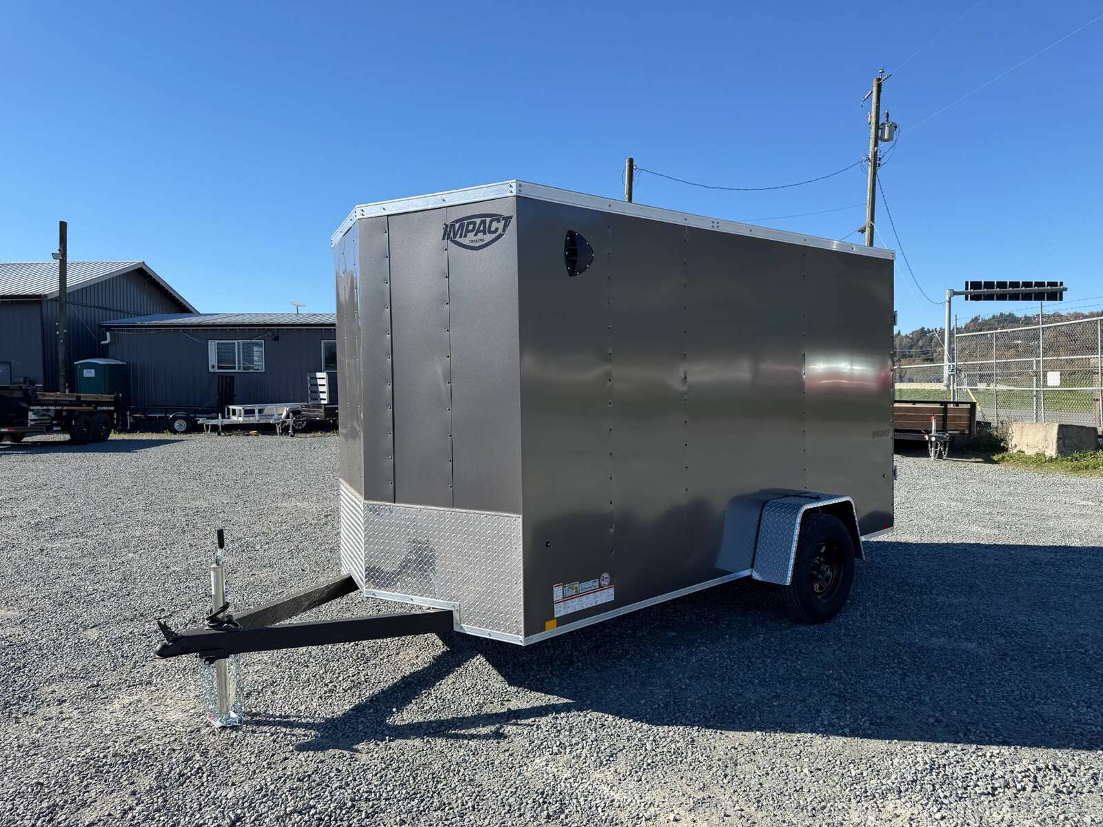 Photo of 2026 Impact Quake 6x12 V Nose Cargo / Enclosed Trailer Charcoal Grey Barn Door Extra Height 2990lb GVW