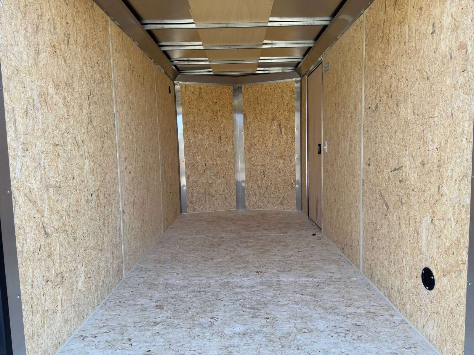Photo of 2026 Impact Quake 6x12 V Nose Cargo / Enclosed Trailer Charcoal Grey Barn Door Extra Height 2990lb GVW